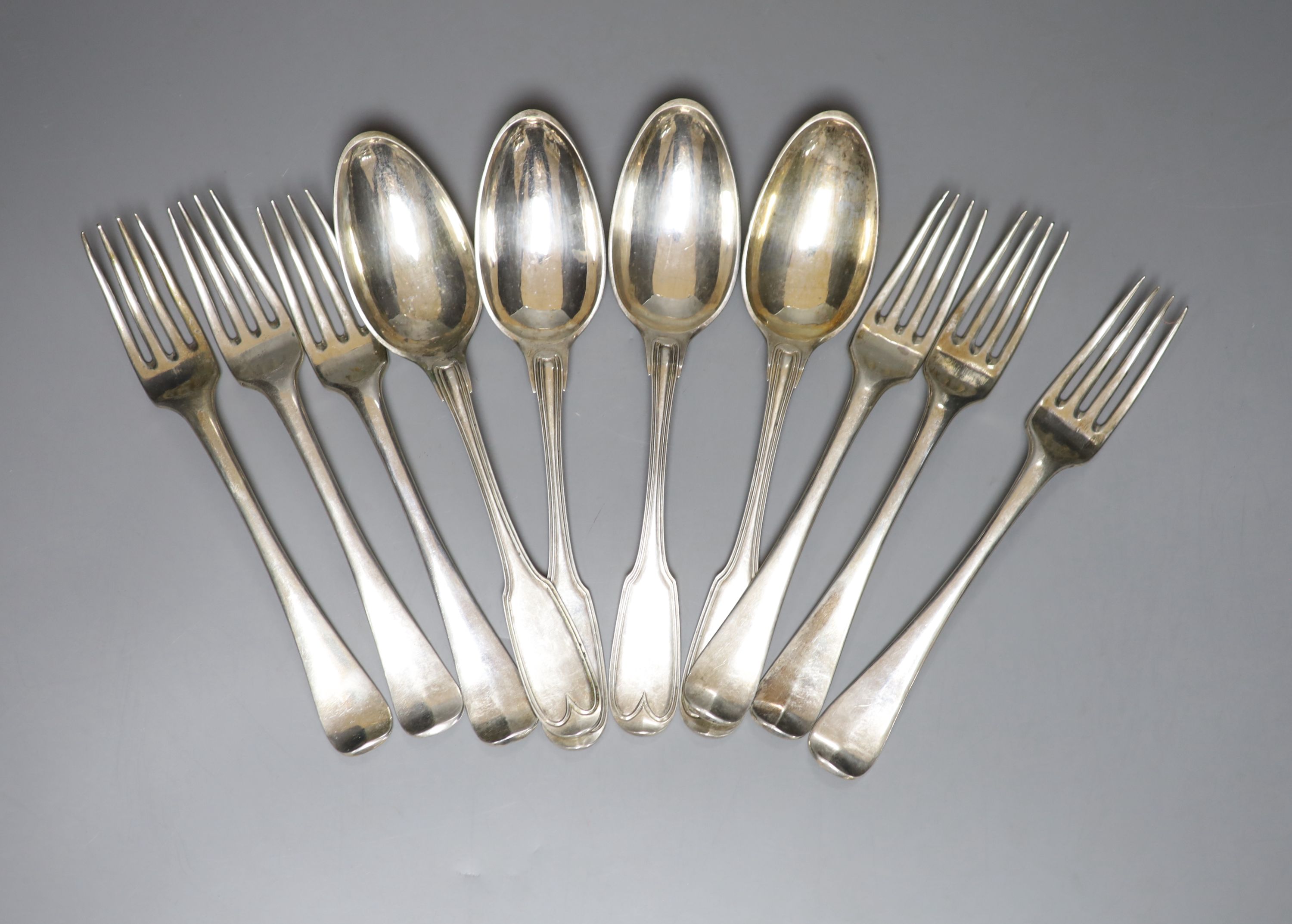 A set of six continental white metal dessert forks by A.Manz and four white metal table spoons